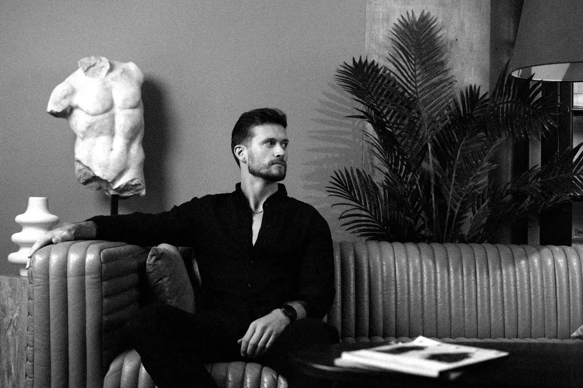 Cameron-Lee Roberts, seated, looking away